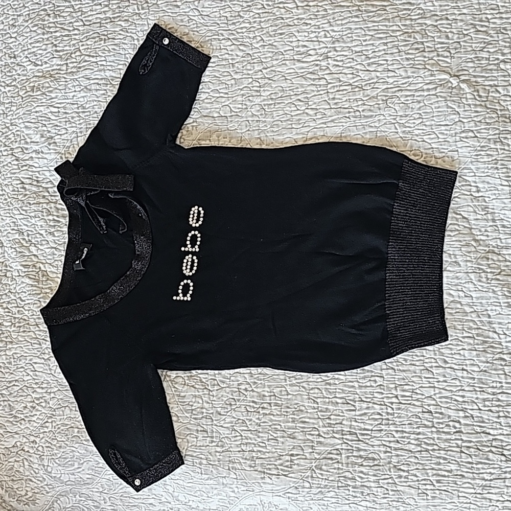 Super cute Bebe sweater. I would say- size S